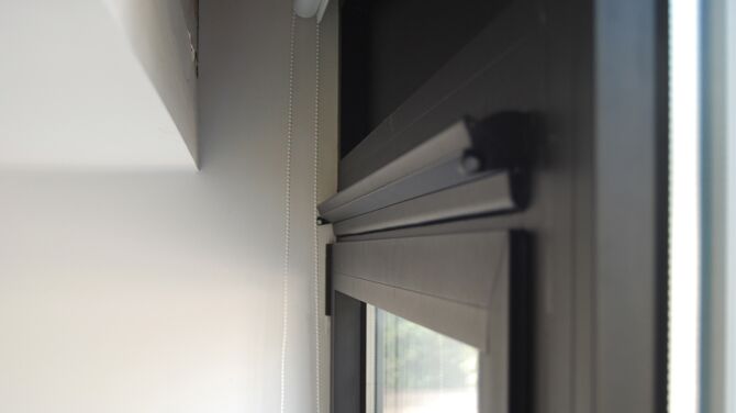 Ventalis ventilation system mounted on window.